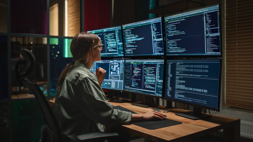 Cyber,Security,Agency:,Female,Programmer,Coding,On,Desktop,Computer,With