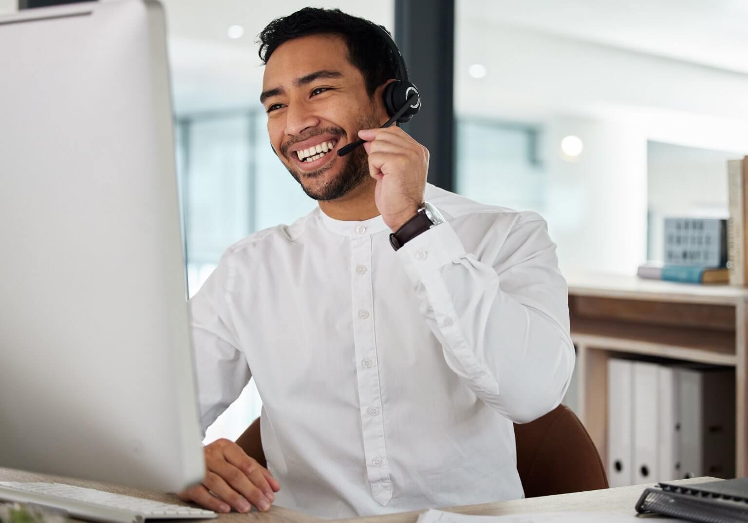 Man,,Happy,And,Reading,In,Call,Center,By,Computer,,Headphones