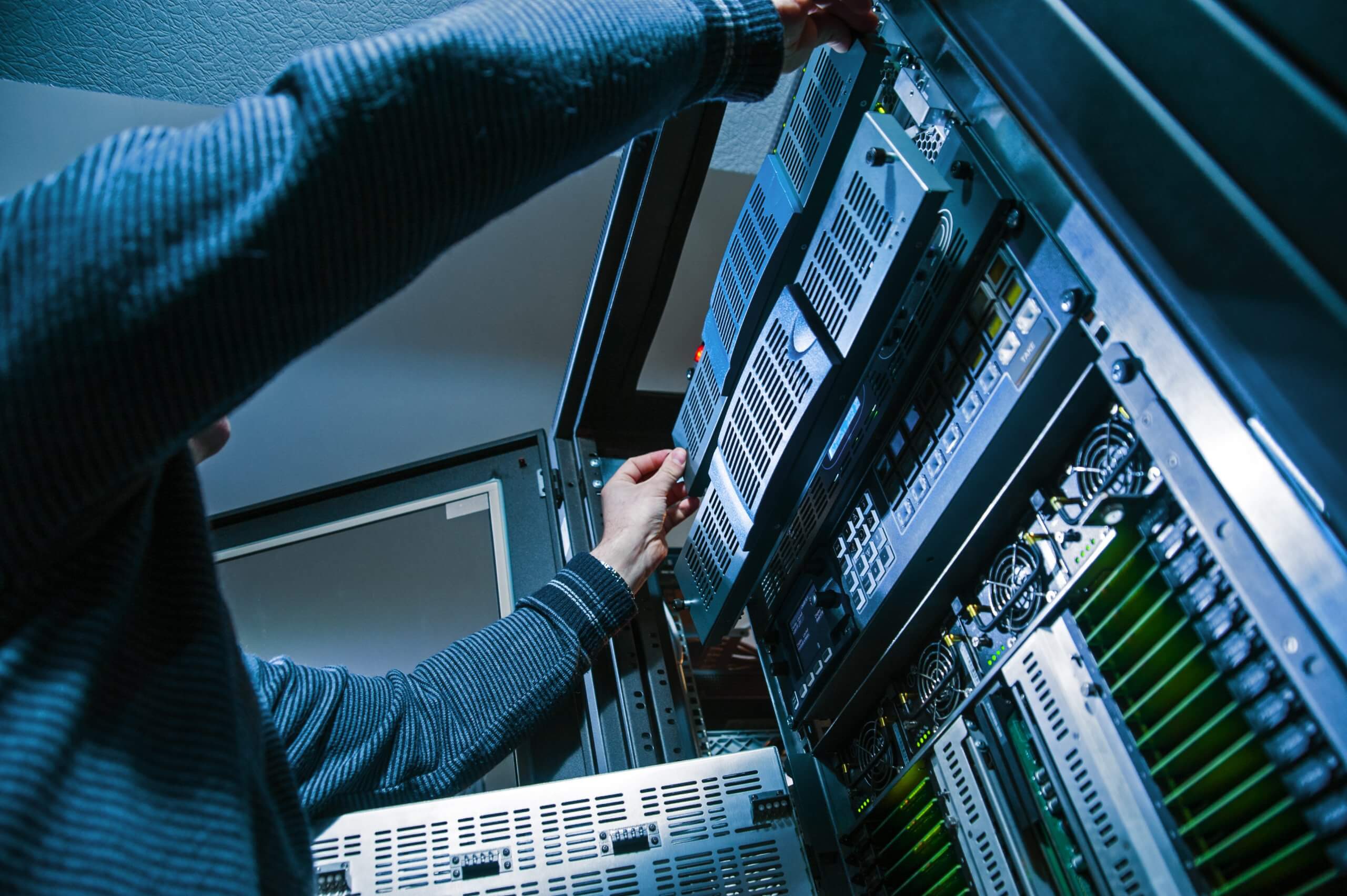Operator,Master,Repairs,Computer,Servers,In,A,Server,Room,,Close up
